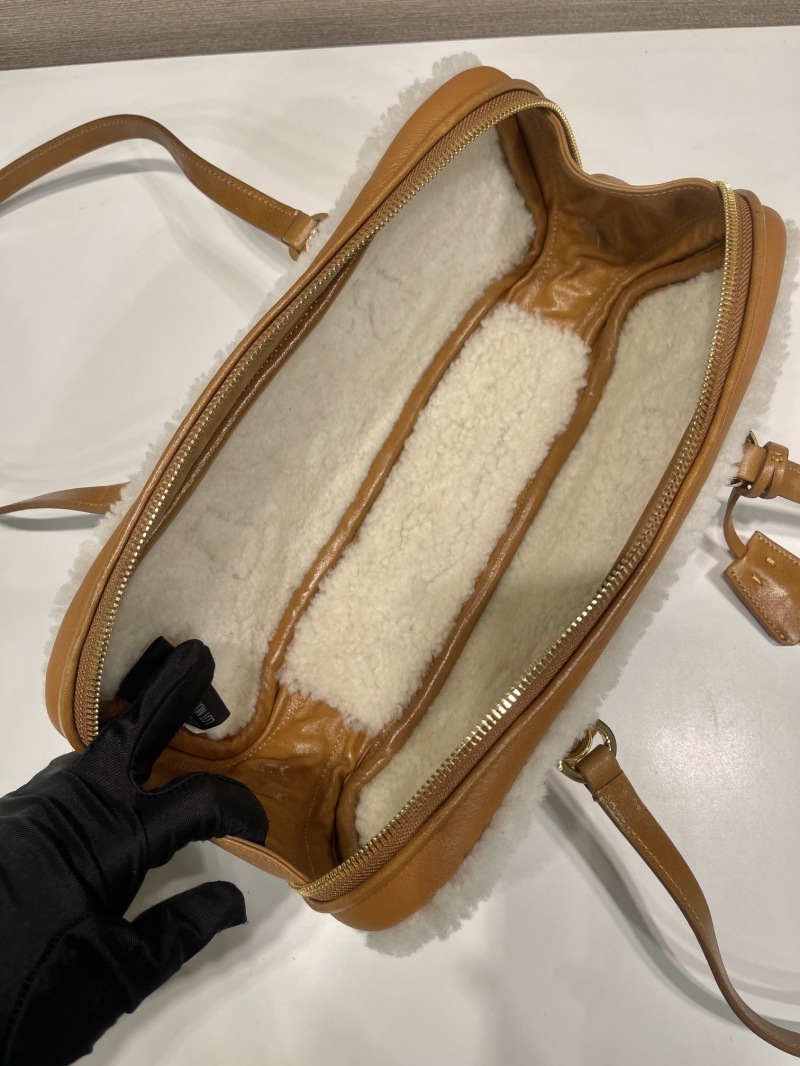 Pra*a top handle bags